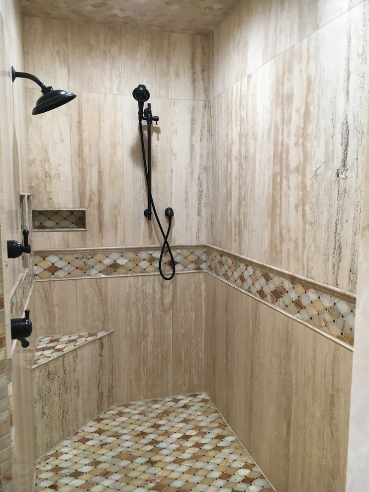 Example of a large eclectic master brown tile and stone tile travertine floor bathroom design in Portland with recessed-panel cabinets and dark wood cabinets