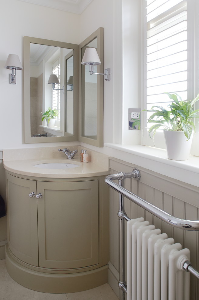 Example of a mid-sized classic master white tile and stone tile marble floor wet room design in Dublin with a wall-mount toilet, an undermount sink, quartz countertops, recessed-panel cabinets and white walls