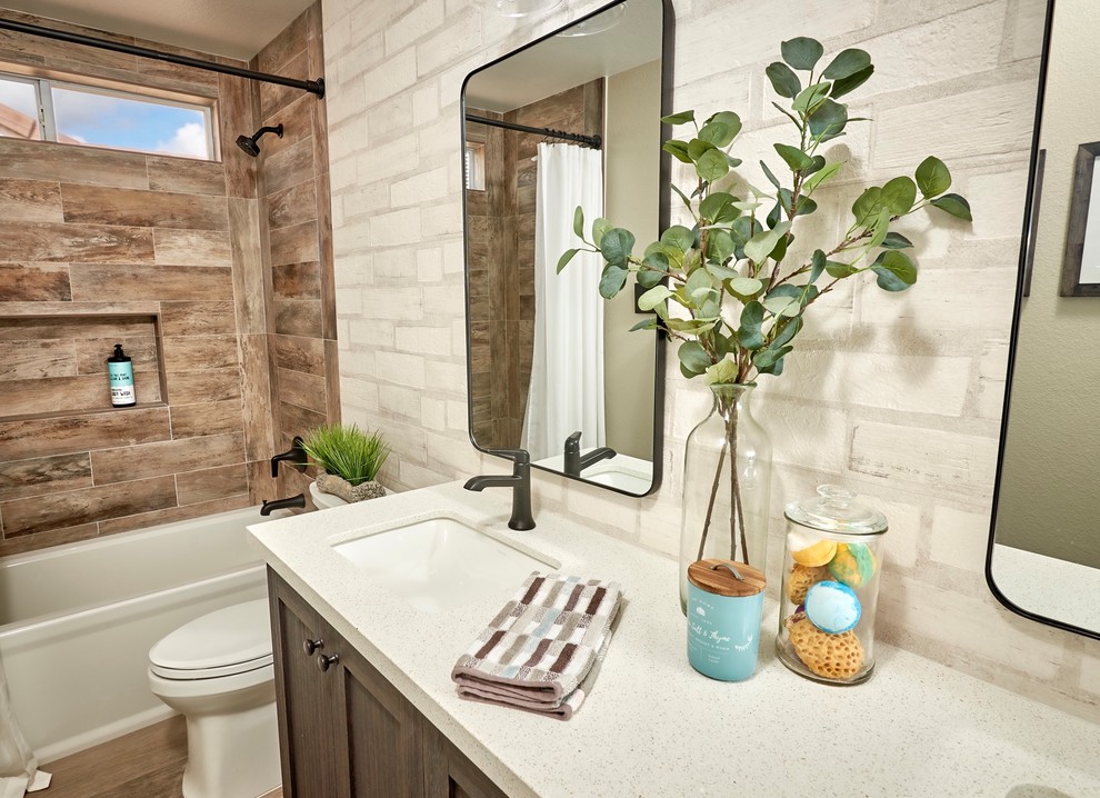 Inspiration for a mid-sized rustic kids' white tile and subway tile porcelain tile and brown floor bathroom remodel in Denver with shaker cabinets, distressed cabinets, a one-piece toilet, white walls, an undermount sink, quartz countertops and white countertops