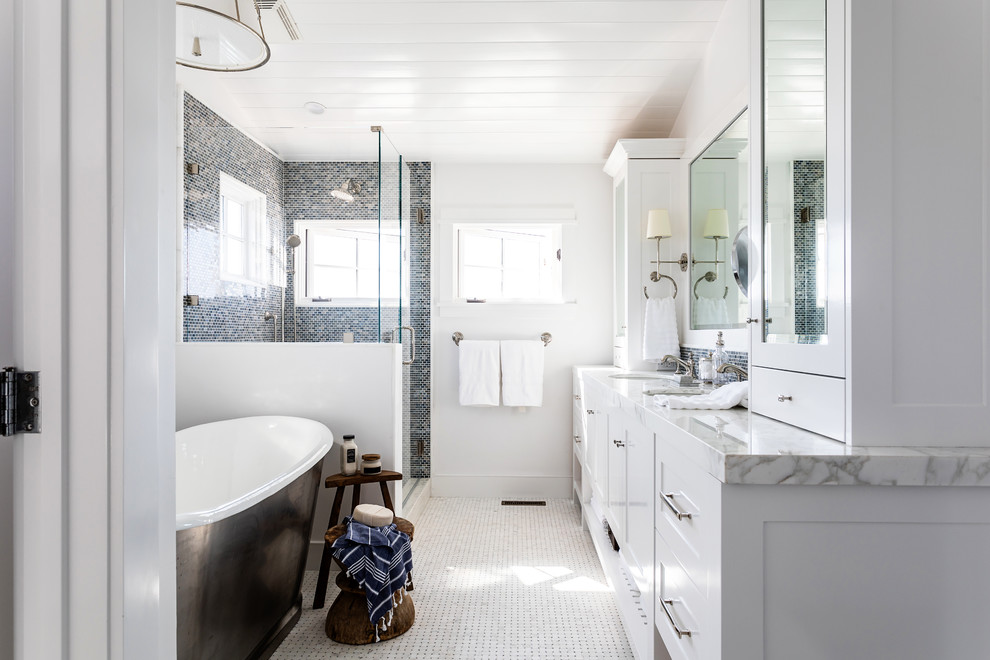 Example of a mid-sized beach style master black tile mosaic tile floor bathroom design in Sacramento with white walls, an undermount sink, quartz countertops, white countertops, shaker cabinets and white cabinets