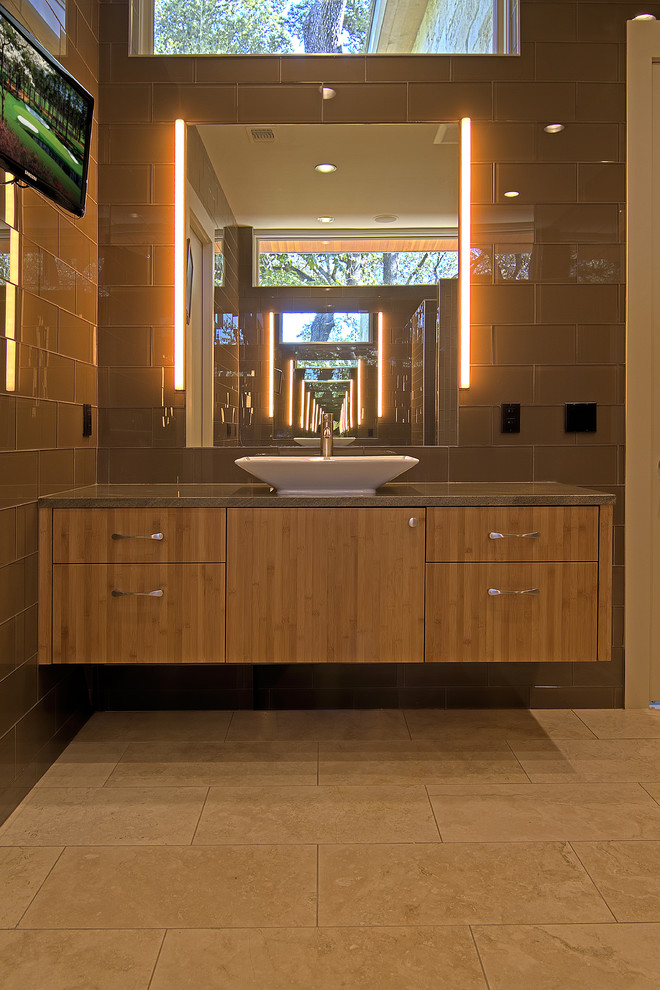 Idée de décoration pour une salle de bain design avec une vasque.