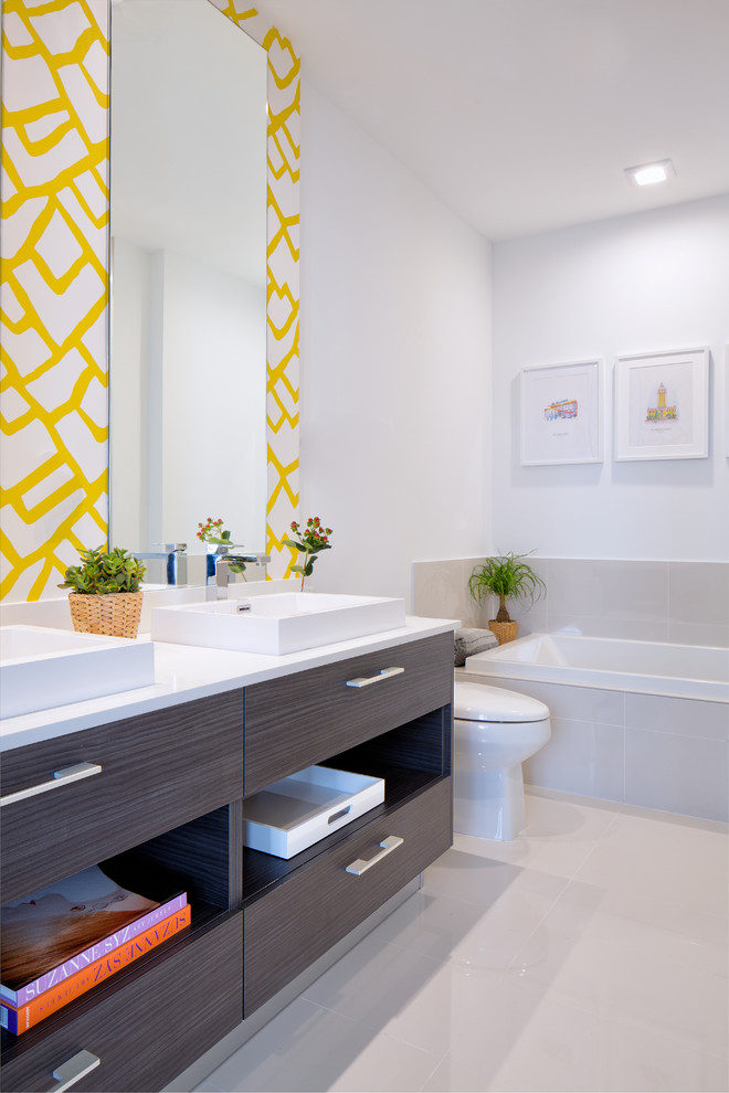 This is an example of a small scandi ensuite bathroom in Miami with flat-panel cabinets, brown cabinets, a built-in bath, a walk-in shower, a two-piece toilet, beige tiles, ceramic tiles, white walls, porcelain flooring, a pedestal sink, quartz worktops, beige floors, an open shower and white worktops.