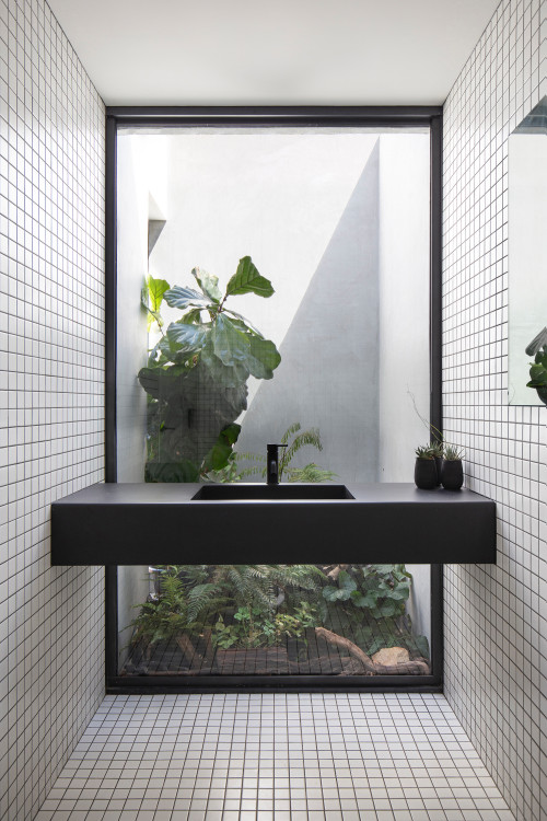 Monochrome Mastery: Contemporary Black and White Square Tile Bathroom