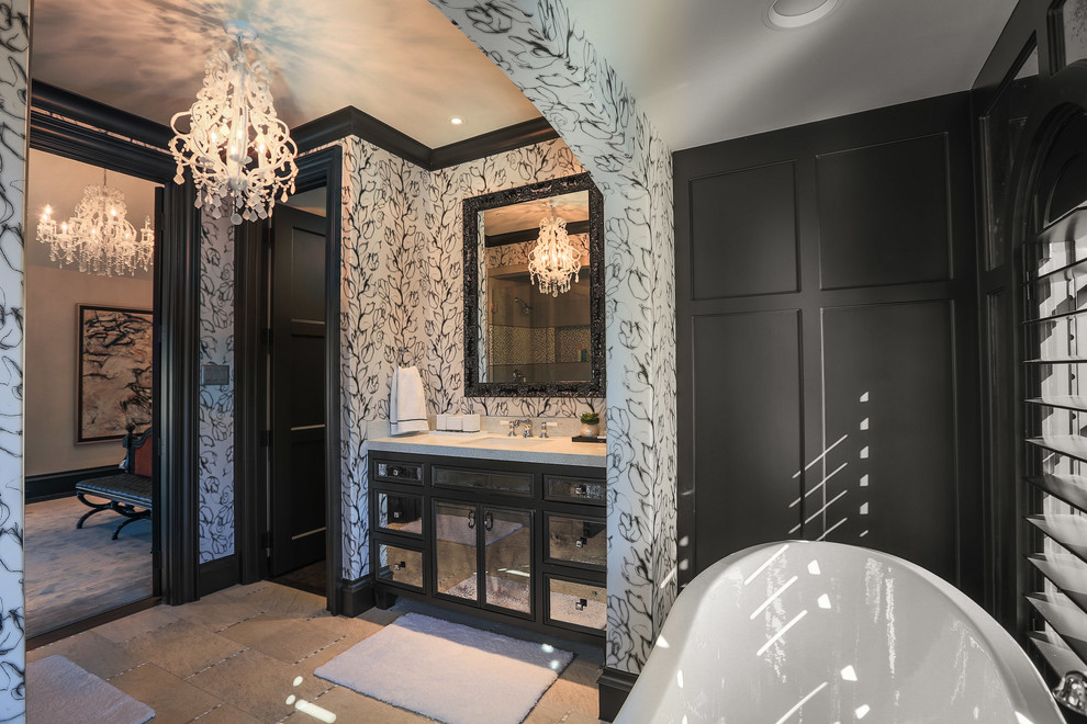 Diseño de cuarto de baño contemporáneo con lavabo bajoencimera, armarios con paneles empotrados y paredes multicolor