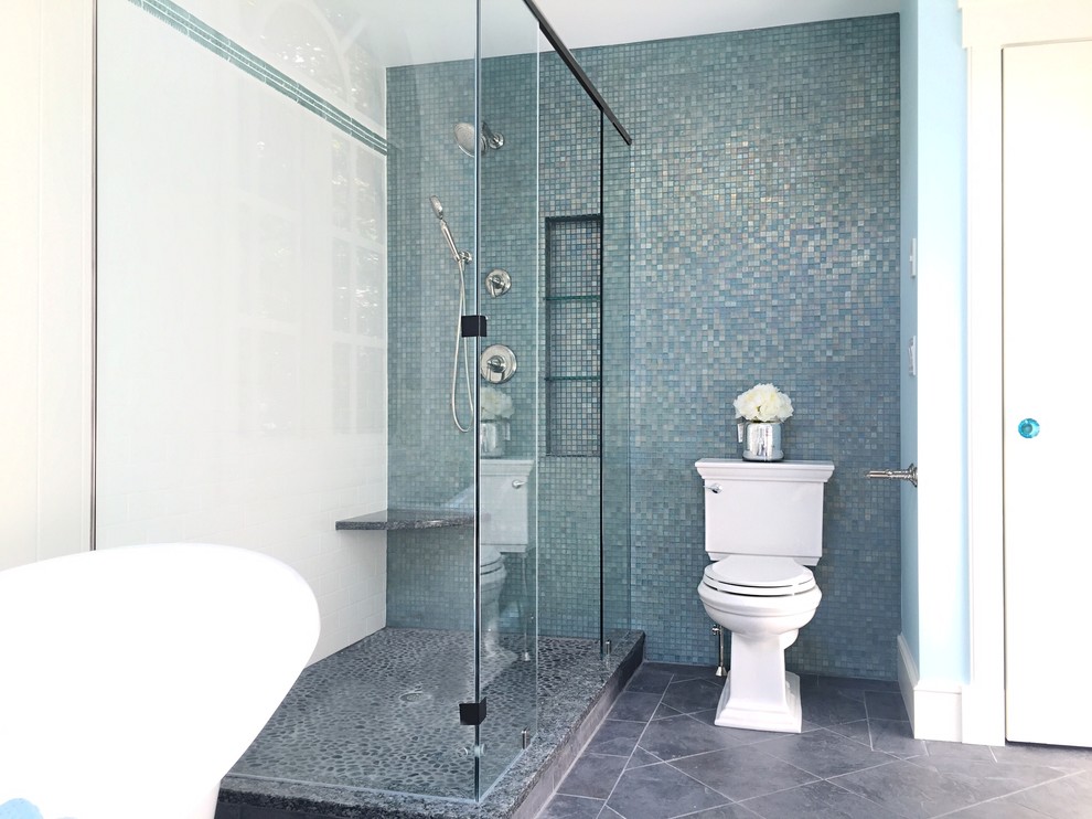 This is an example of a large nautical ensuite bathroom in Boston with a built-in sink, white cabinets, granite worktops, a freestanding bath, a walk-in shower, white tiles, metro tiles, blue walls and slate flooring.