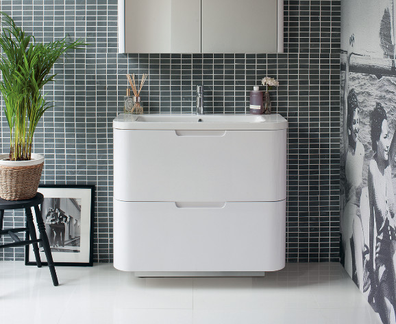 Inspiration for a medium sized contemporary family bathroom in Cambridgeshire with flat-panel cabinets, white cabinets, a built-in bath, a built-in shower, a one-piece toilet, grey tiles, porcelain tiles, grey walls, marble flooring and a pedestal sink.