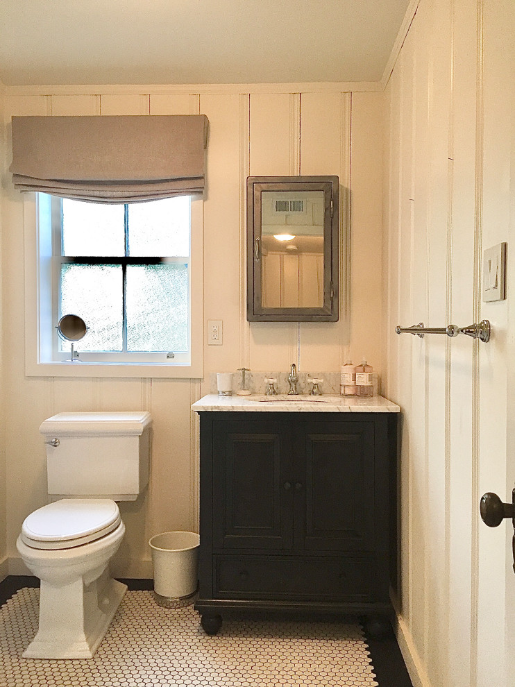 Example of a small ornate 3/4 white tile and marble tile ceramic tile, black floor, single-sink and wall paneling corner shower design in San Francisco with beaded inset cabinets, black cabinets, a two-piece toilet, white walls, an undermount sink, marble countertops, a hinged shower door, white countertops and a freestanding vanity
