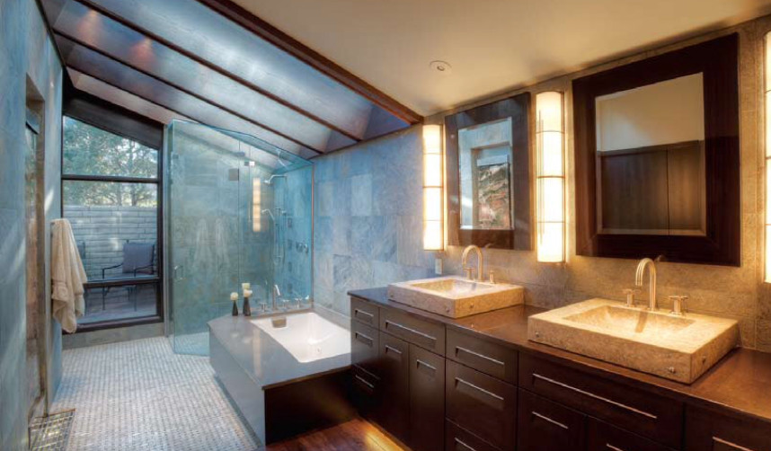 Diseño de cuarto de baño principal actual de tamaño medio con armarios con paneles lisos, puertas de armario de madera en tonos medios, bañera encastrada sin remate, ducha empotrada, lavabo tipo consola y encimera de cuarcita