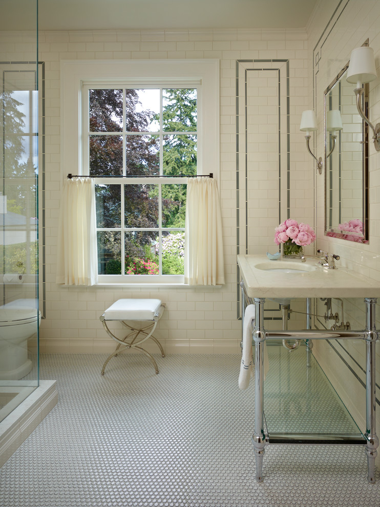 Example of a cottage chic mosaic tile floor bathroom design in Seattle with a console sink