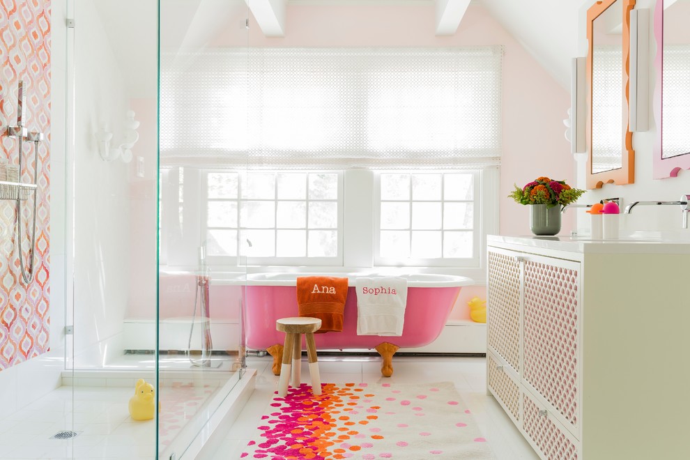 Transitional kids' multicolored tile, orange tile and pink tile freestanding bathtub photo in Boston with pink walls