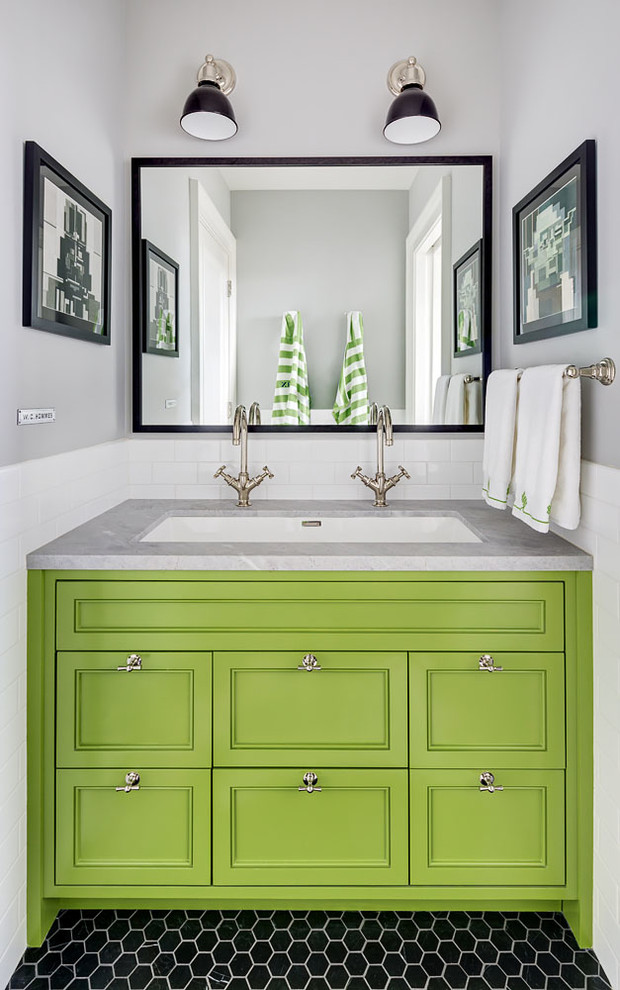 This is an example of a traditional bathroom in New York with recessed-panel cabinets, green cabinets, white tiles, metro tiles, grey walls, mosaic tile flooring, a submerged sink, black floors and grey worktops.