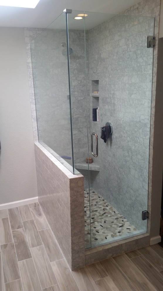 Photo of a medium sized traditional bathroom in Phoenix with shaker cabinets, grey cabinets, a corner shower, a two-piece toilet, grey walls, porcelain flooring, a submerged sink and marble worktops.