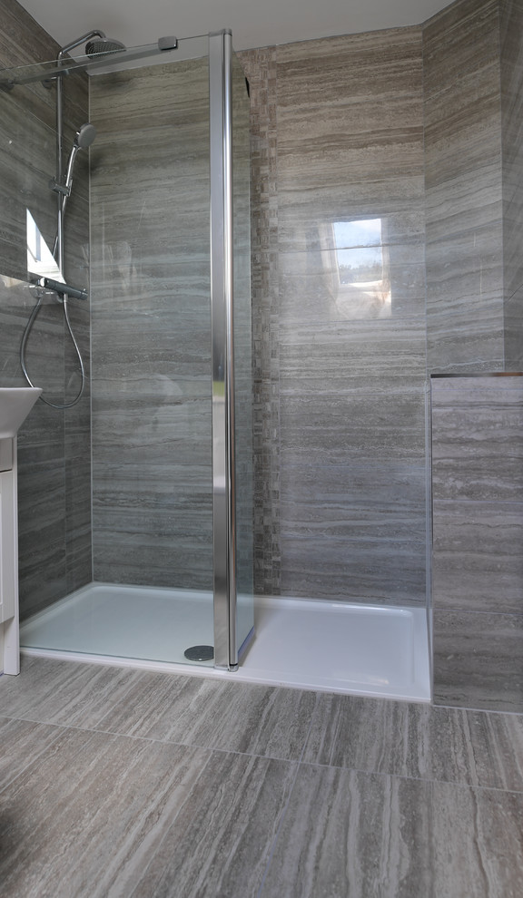 Contemporary bathroom in London with brown tiles, porcelain tiles, porcelain flooring, brown floors and brown walls.
