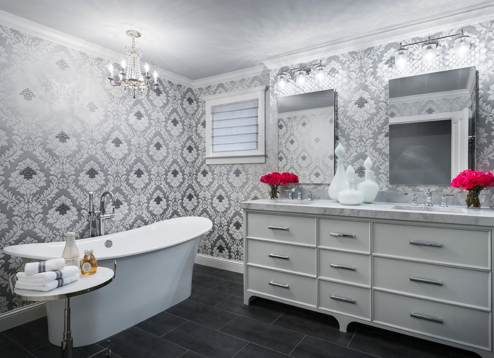 Example of a transitional master freestanding bathtub design in Minneapolis with an undermount sink, white cabinets, multicolored walls and recessed-panel cabinets