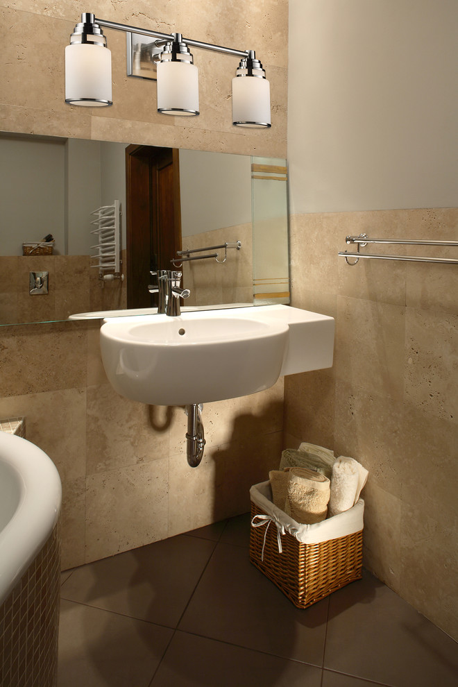 Mid-sized trendy master beige tile and ceramic tile drop-in bathtub photo in New York with a wall-mount sink and beige walls