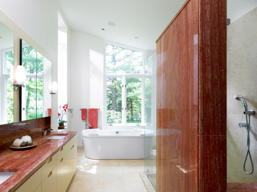 Идея дизайна: ванная комната в современном стиле с врезной раковиной, плоскими фасадами, бежевыми фасадами, отдельно стоящей ванной, красной плиткой, плиткой из листового камня, красной столешницей, белыми стенами и бежевым полом