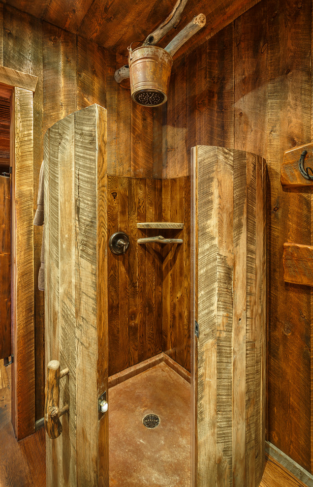 Imagen de cuarto de baño infantil rural con puertas de armario de madera en tonos medios, ducha esquinera, suelo de madera oscura, lavabo de seno grande y encimera de madera