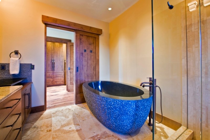 Design ideas for a rustic bathroom in Vancouver with a freestanding bath and a corner shower.