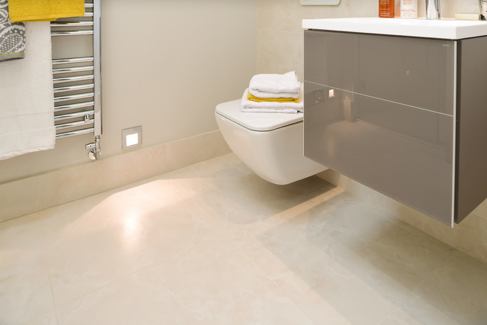 Design ideas for a contemporary bathroom in London with porcelain flooring, beige floors, beige tiles and porcelain tiles.