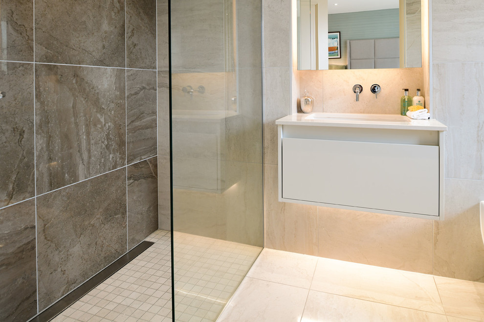 This is an example of a contemporary bathroom in London with brown tiles, porcelain tiles, porcelain flooring and beige floors.