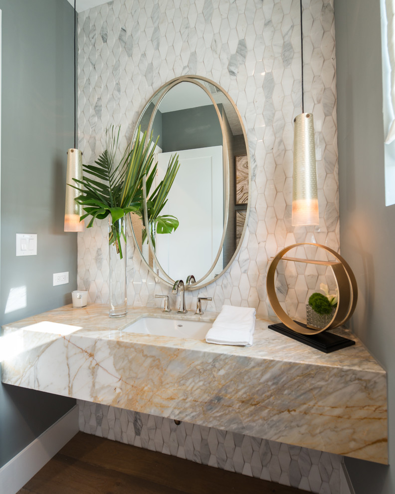 This is an example of a shower room bathroom in Austin with open cabinets, grey tiles, marble tiles, grey walls, medium hardwood flooring, a submerged sink and brown floors.