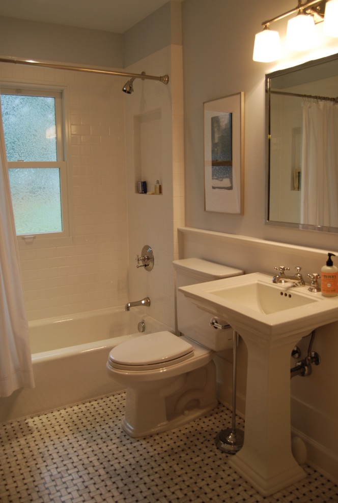 Example of a mid-sized classic white tile and mosaic tile mosaic tile floor and multicolored floor bathroom design in Denver with a pedestal sink, a one-piece toilet and white walls