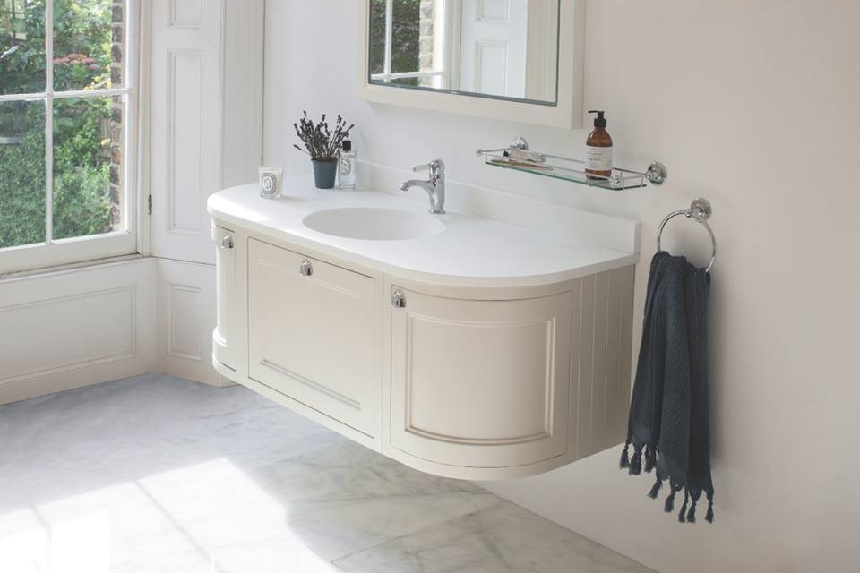 Inspiration for a medium sized classic family bathroom in Cambridgeshire with shaker cabinets, medium wood cabinets, a claw-foot bath, a built-in shower, a one-piece toilet, white tiles, ceramic tiles, white walls, porcelain flooring, a pedestal sink and marble worktops.