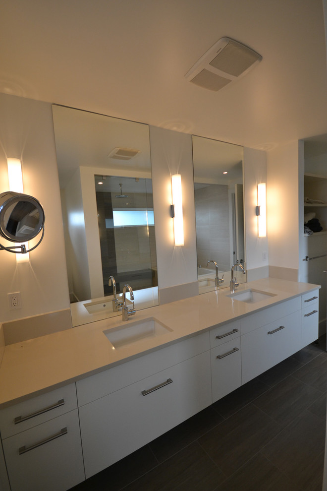 Inspiration for a large contemporary master bathroom remodel in Vancouver with flat-panel cabinets, white cabinets, a one-piece toilet and gray walls