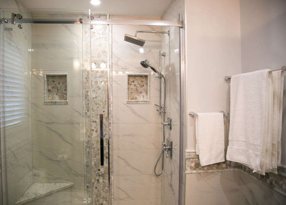 Design ideas for a medium sized mediterranean bathroom in Vancouver with raised-panel cabinets, dark wood cabinets, an alcove shower, a one-piece toilet, beige tiles, mosaic tiles, grey walls, mosaic tile flooring, a vessel sink and granite worktops.