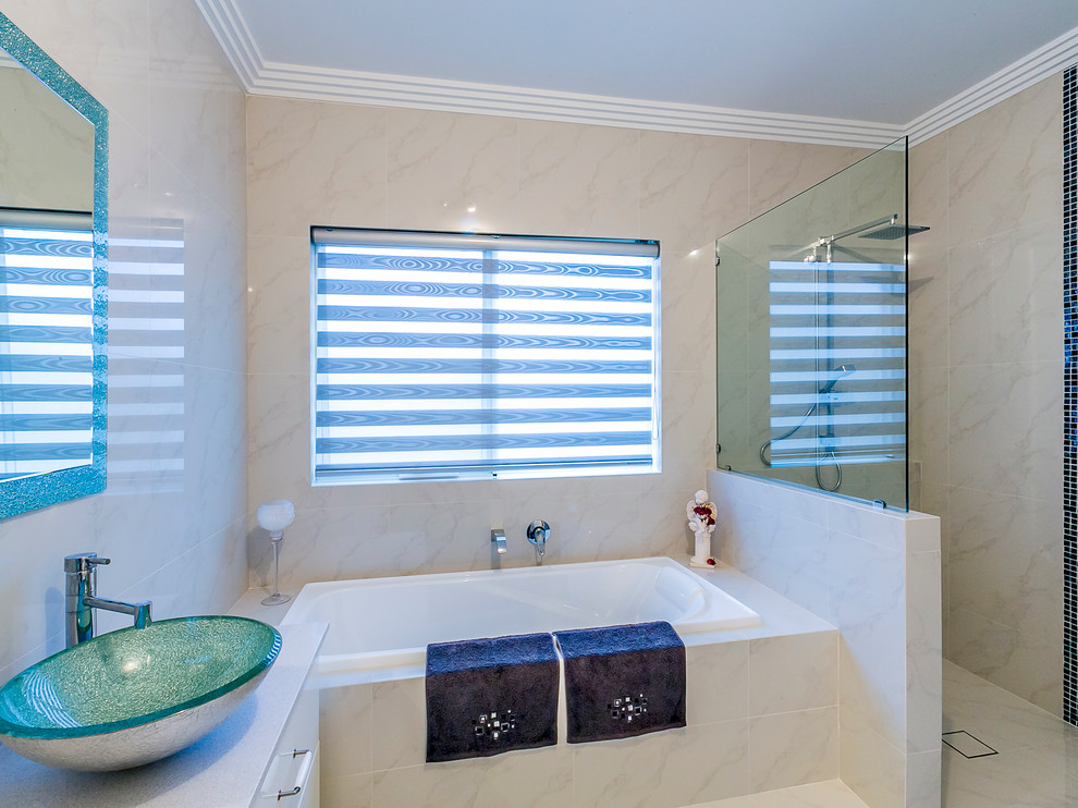 Large contemporary family bathroom in Perth with white cabinets, engineered stone worktops and porcelain tiles.
