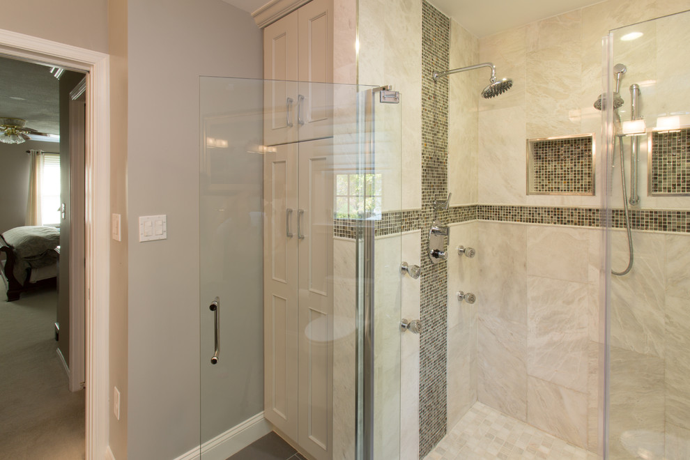 Medium sized traditional ensuite bathroom in DC Metro with an alcove shower, recessed-panel cabinets, grey cabinets, a one-piece toilet, grey tiles, ceramic tiles, beige walls, a submerged sink, granite worktops and a hinged door.