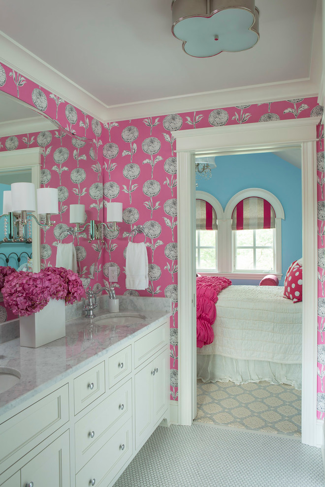 Bathroom - transitional kids' white tile and porcelain tile bathroom idea in Minneapolis with an undermount sink, recessed-panel cabinets, white cabinets, marble countertops, pink walls and gray countertops