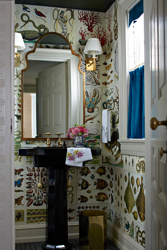 Inspiration for a timeless mosaic tile floor and gray floor bathroom remodel in Other with a two-piece toilet, multicolored walls and a pedestal sink