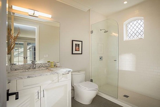 Photo of a classic shower room bathroom in San Francisco with a submerged sink, shaker cabinets, white cabinets, marble worktops, a walk-in shower, a one-piece toilet, white tiles, porcelain tiles, grey walls and mosaic tile flooring.