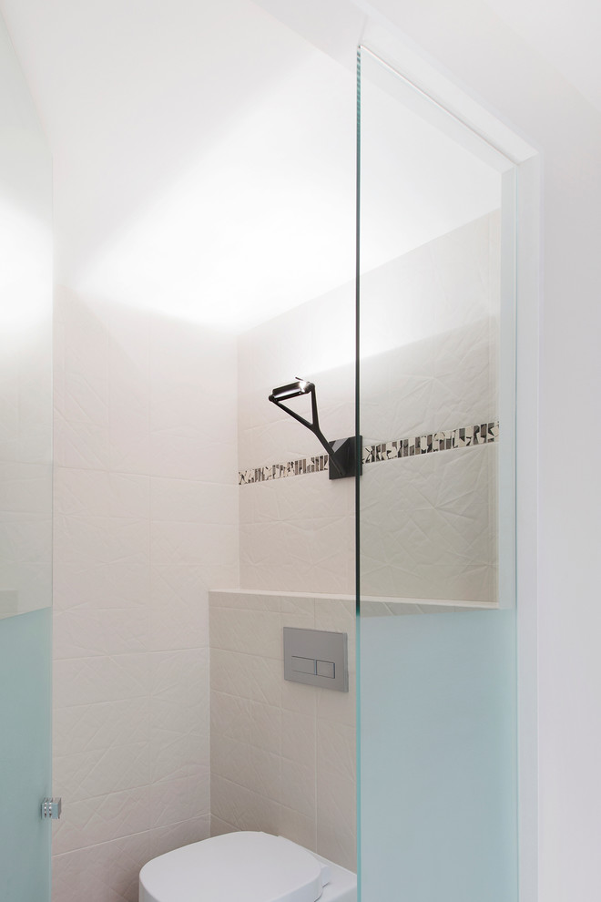 Example of a large trendy master porcelain tile double shower design in Toronto with a wall-mount sink, flat-panel cabinets, dark wood cabinets, concrete countertops, a wall-mount toilet and white walls