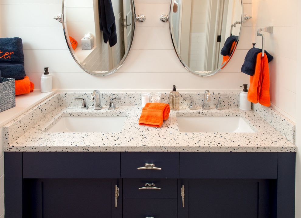 Bathroom - mid-sized traditional kids' multicolored tile porcelain tile bathroom idea in Charleston with furniture-like cabinets, blue cabinets, white walls, an undermount sink and recycled glass countertops