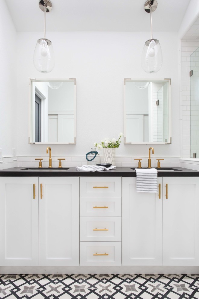 Inspiration for a medium sized traditional ensuite bathroom in Orange County with white walls, ceramic flooring, shaker cabinets, white cabinets, white tiles, a submerged sink and multi-coloured floors.