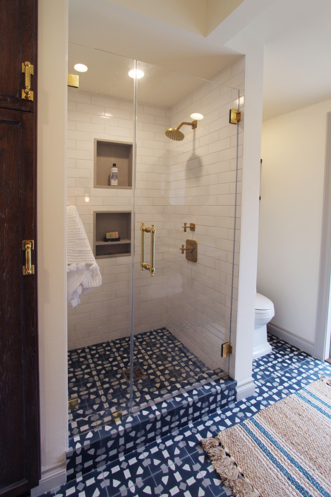 Example of a mid-sized transitional 3/4 white tile and porcelain tile cement tile floor, blue floor, single-sink, shiplap wall and exposed beam alcove shower design in Los Angeles with open cabinets, distressed cabinets, a two-piece toilet, white walls, a vessel sink, concrete countertops, a hinged shower door, gray countertops, a niche and a freestanding vanity