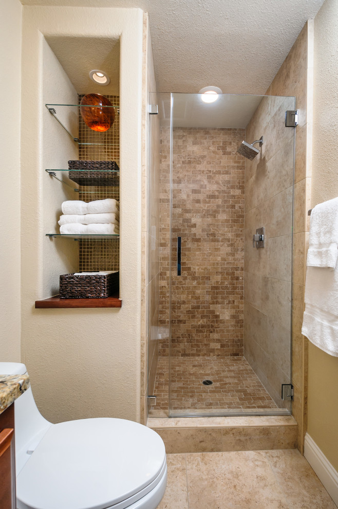 This is an example of a medium sized traditional bathroom in San Francisco with a submerged sink, freestanding cabinets, medium wood cabinets, granite worktops, a walk-in shower, a one-piece toilet, beige tiles, beige walls and ceramic flooring.