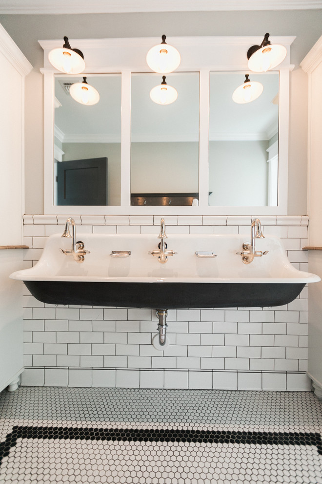 Example of a mid-sized classic kids' porcelain tile bathroom design in Phoenix with shaker cabinets, white cabinets, gray walls, a trough sink and soapstone countertops