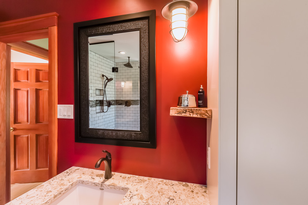 This is an example of a large contemporary ensuite bathroom in Vancouver with freestanding cabinets, light wood cabinets, a claw-foot bath, a corner shower, a two-piece toilet, white tiles, metro tiles, beige walls, dark hardwood flooring, a submerged sink, granite worktops and a hinged door.