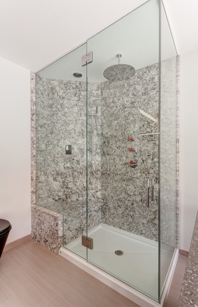 Inspiration for a large contemporary master stone slab corner shower remodel in Chicago with quartz countertops and white walls