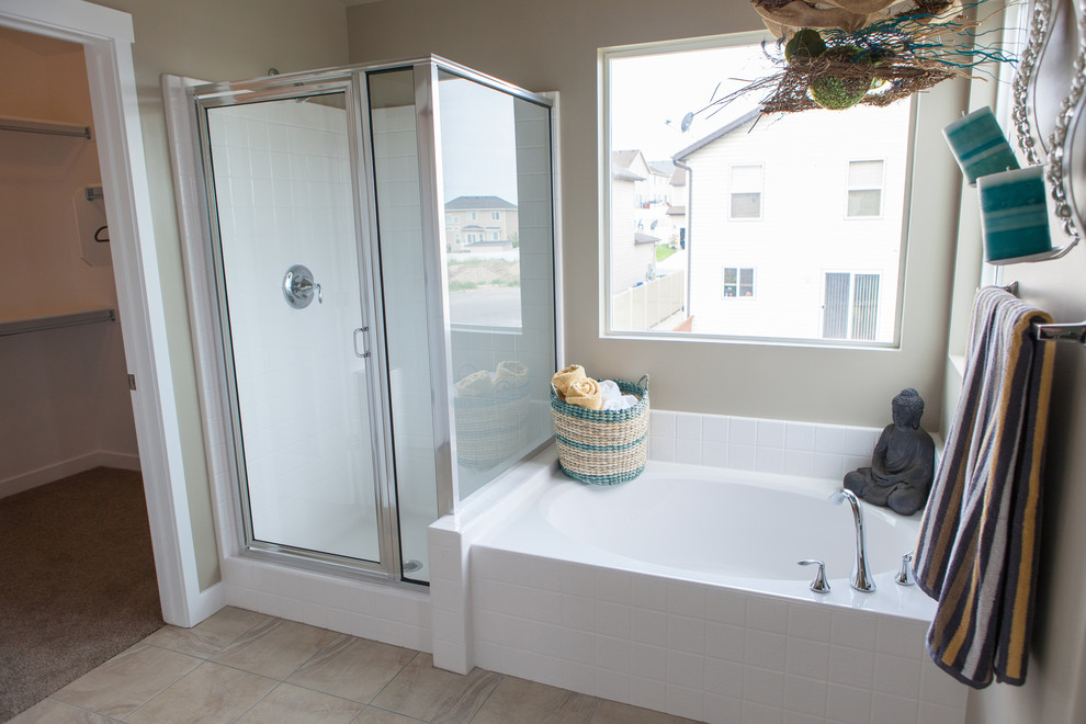 Photo of a medium sized traditional ensuite bathroom in Salt Lake City with a built-in sink, recessed-panel cabinets, white cabinets, laminate worktops, a corner bath, a corner shower, a one-piece toilet, beige tiles, mosaic tiles, beige walls and ceramic flooring.