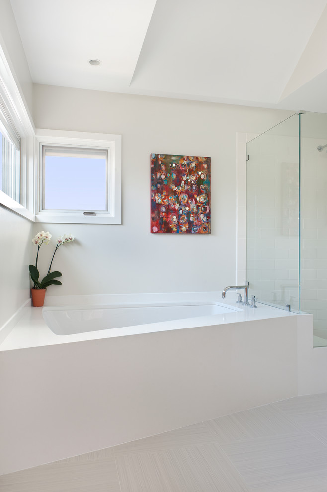 Example of a trendy bathroom design in Boston with an undermount tub