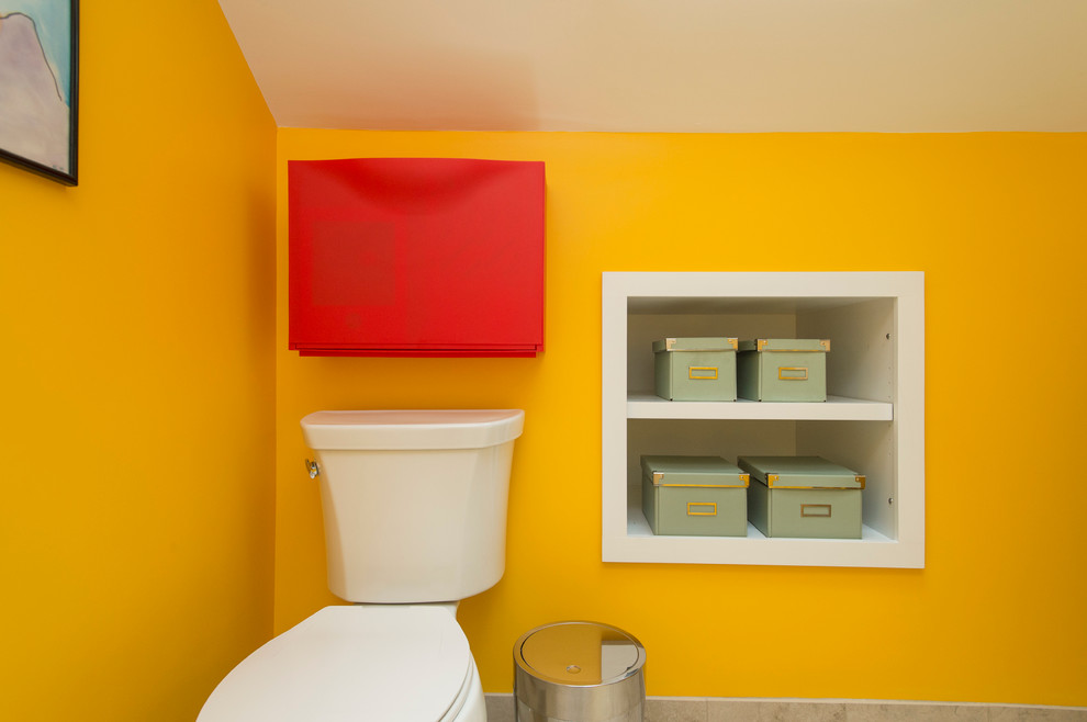 Inspiration for a small contemporary 3/4 beige tile and ceramic tile ceramic tile corner shower remodel in Boston with a two-piece toilet, yellow walls and a console sink
