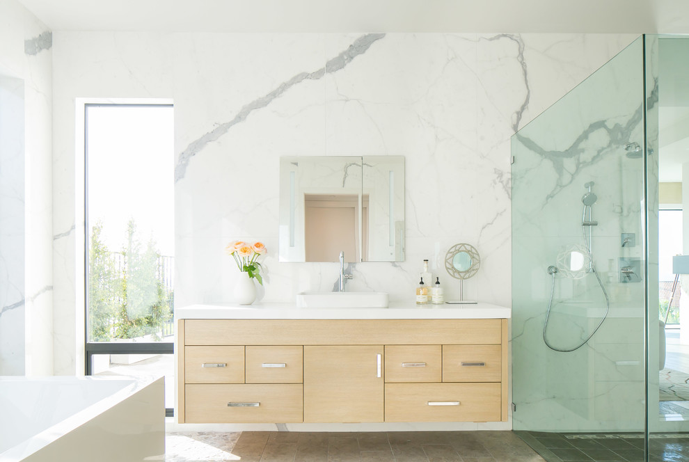 Inspiration for a contemporary ensuite bathroom in Orange County with flat-panel cabinets, light wood cabinets, multi-coloured walls and a built-in sink.