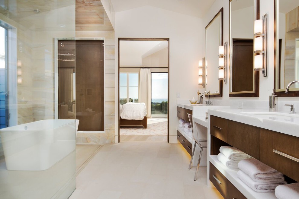 Design ideas for a contemporary ensuite bathroom in Los Angeles with flat-panel cabinets, dark wood cabinets, a freestanding bath, a built-in shower, white walls, a submerged sink and an open shower.