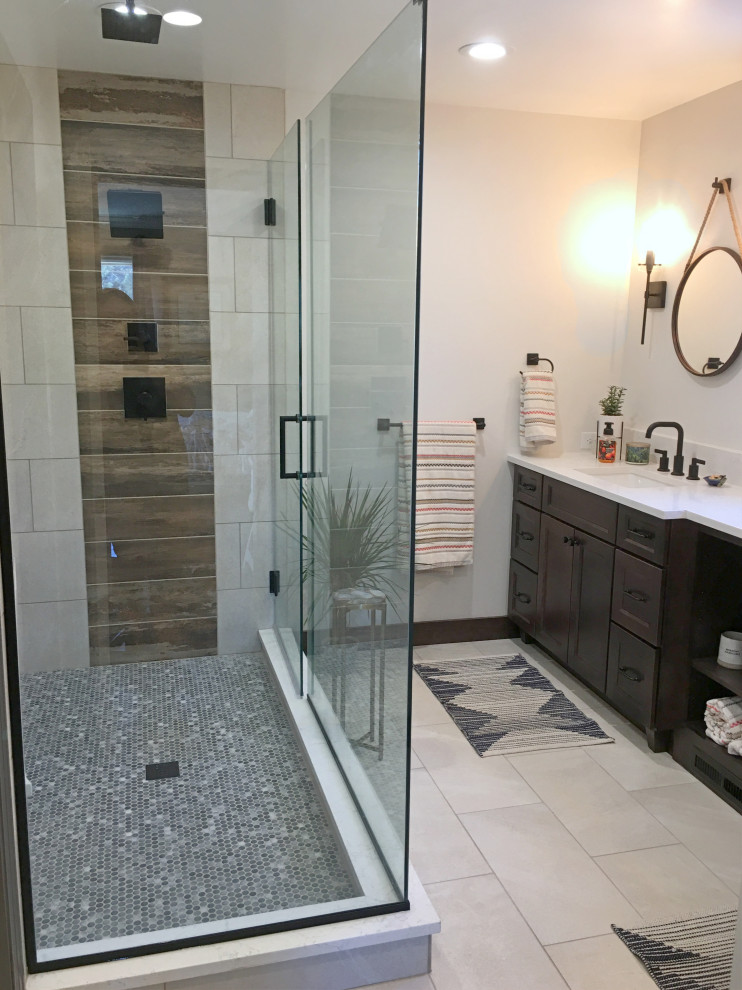 Inspiration for a medium sized classic ensuite bathroom in Denver with recessed-panel cabinets, dark wood cabinets, a built-in shower, a submerged sink, engineered stone worktops, a hinged door and white worktops.