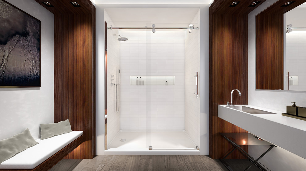 Foto på ett mellanstort funkis en-suite badrum, med ett integrerad handfat, bänkskiva i kalksten, en dusch i en alkov, grå kakel, stenhäll, vita väggar och mellanmörkt trägolv