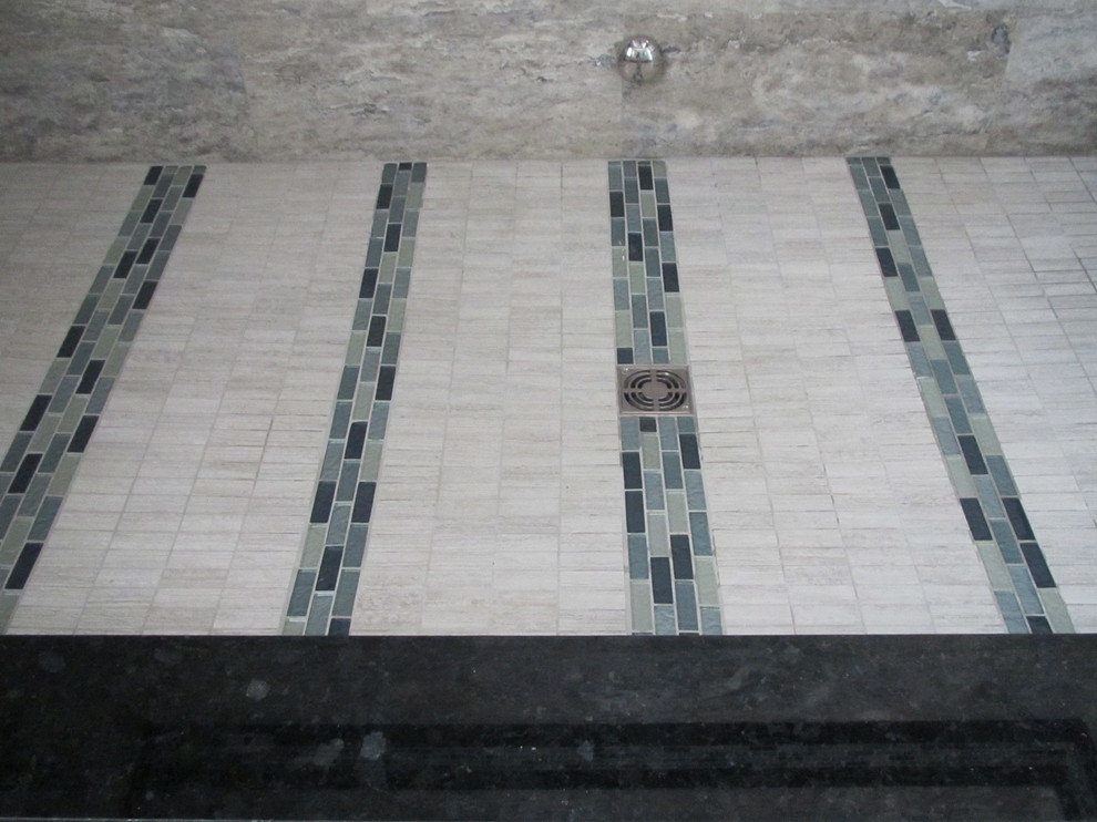Example of a large tuscan multicolored tile and stone tile travertine floor sauna design in New Orleans with blue walls